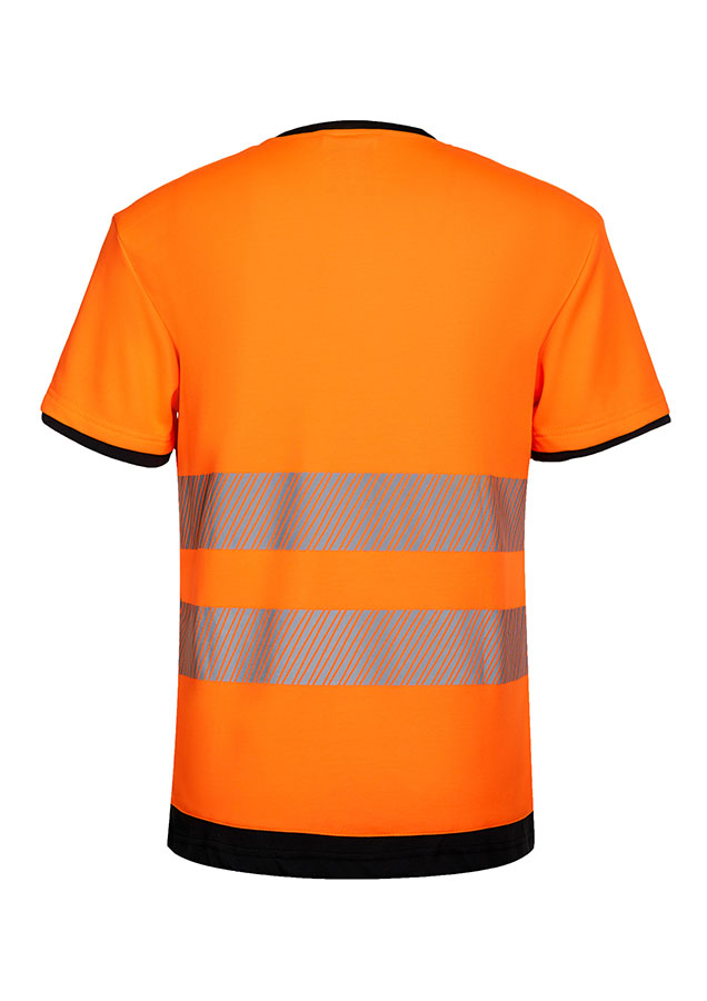 Erwachsener in signalgelbem Korntex-T-Shirt mit schwarzer Brustpartie und Reflexstreifen in einem industriellen Umfeld