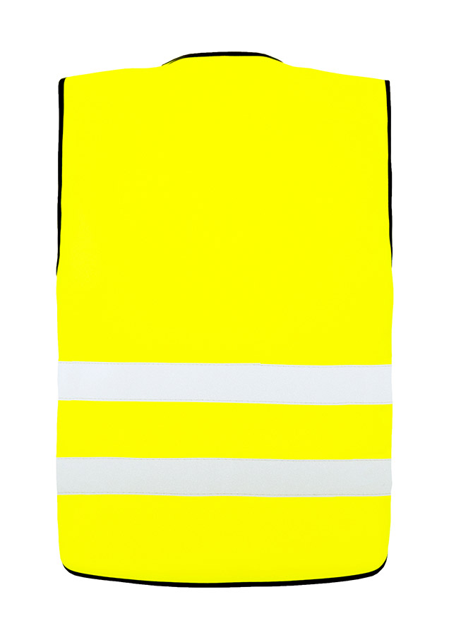 Erwachsener in gelber Korntex Warnweste mit Klettverschluss und schwarzem Saum steht auf einer Baustelle.