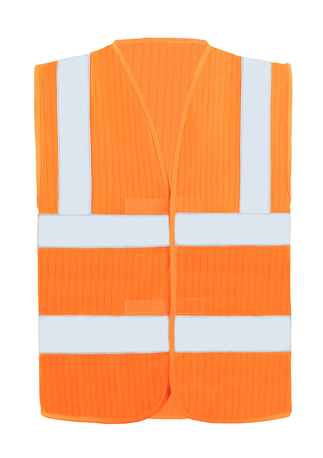Erwachsener Bauarbeiter in signal orangener Korntex Warnweste mit Reflexstreifen und Helm steht in einer verlassenen Ruine